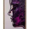 Mockup of glass woman in profile with a purple moonlike landscape etched across her face, inside a sleek wood frame