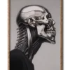 Mockup of a silver chrome cyborg skull dressed in black, reflecting an industrial aesthetic in a sleek wood frame